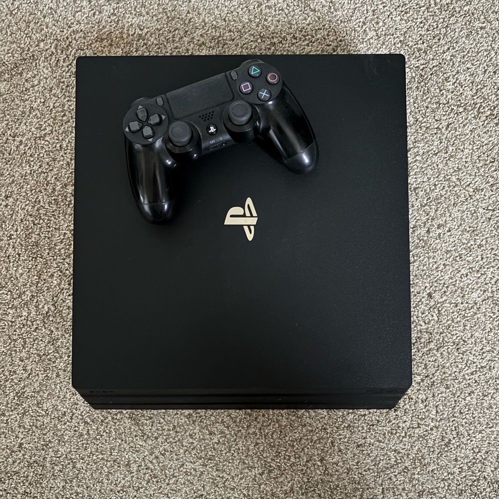 Sony Black PlayStation Pro Console with DualShock 4